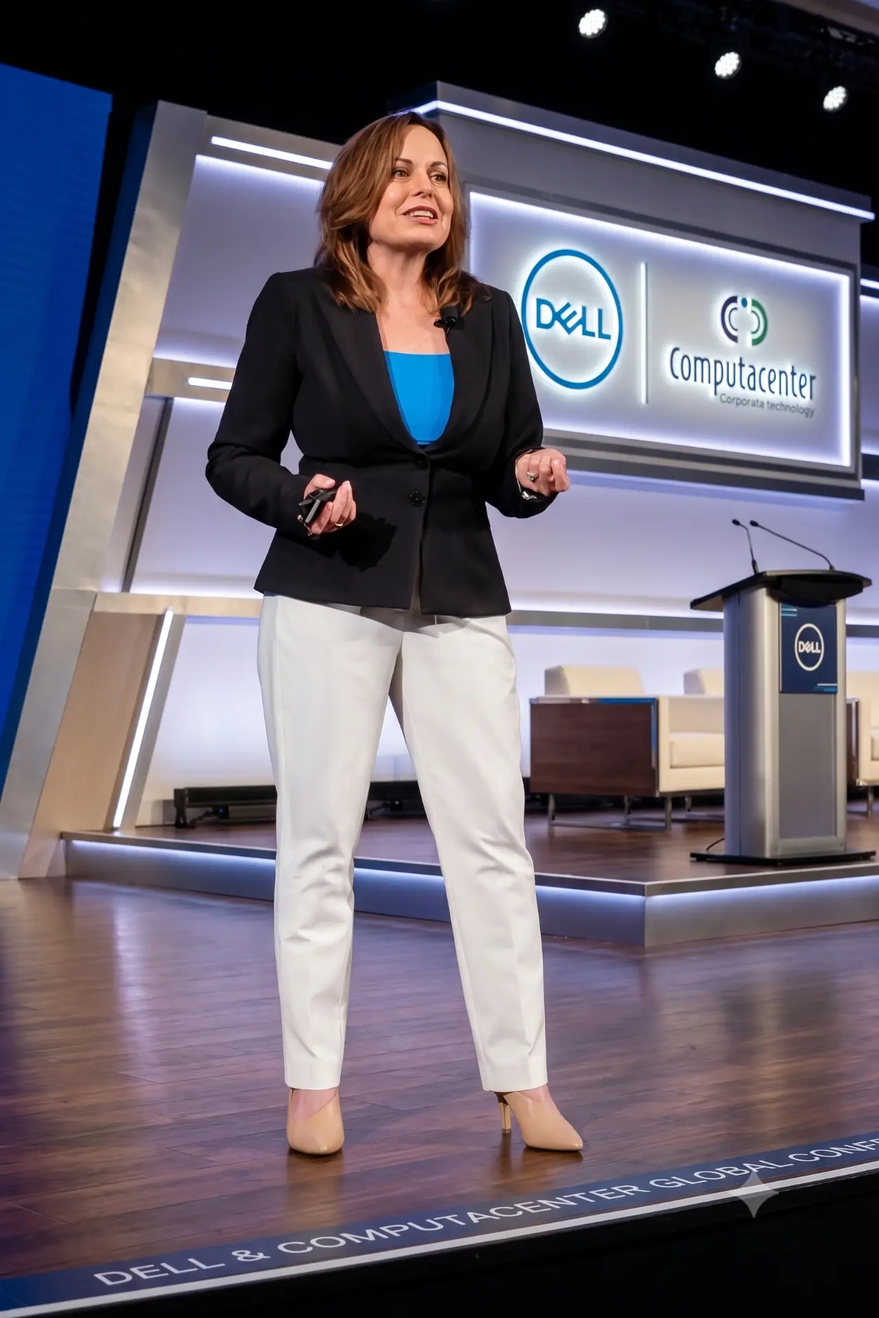 Dr. Lisa Palmer presenting on stage at the Dell and Computacenter Global Conference