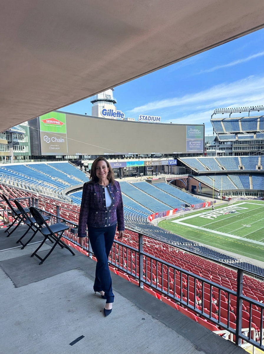 Dr. Lisa Palmer on stage at Gillette Stadium