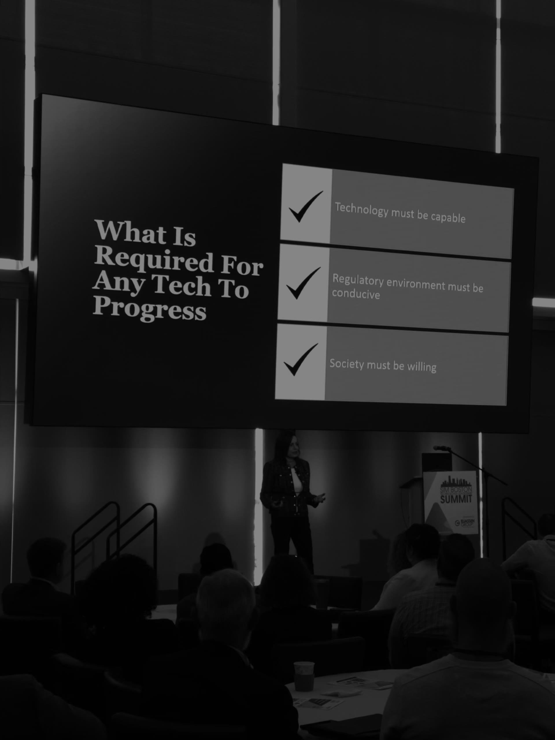 Dr. Lisa Palmer delivering a keynote to technology leaders